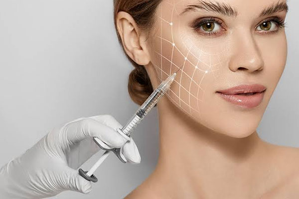 Cosmetic practitioner administering a precise facial injectable treatment